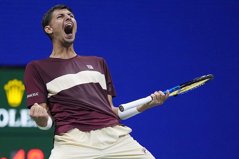 | Photo: AP/Julia Nikhinson : US Open 2024: Alexei Popyrin, of Australia, reacts after beating Novak Djokovic, of Serbia